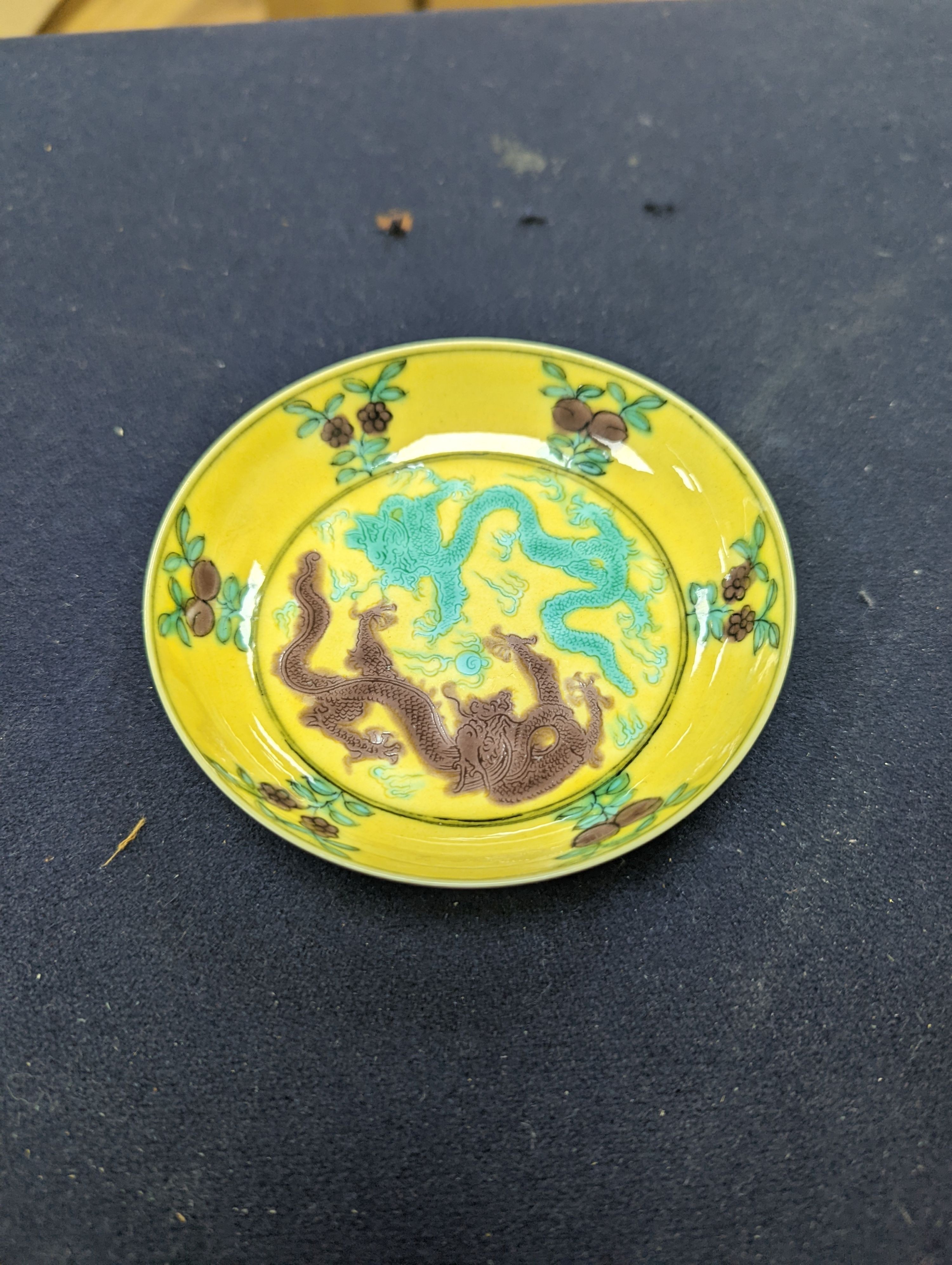 A pair of Chinese yellow, green and aubergine dragon dishes, Guangxu marks, 10cm.